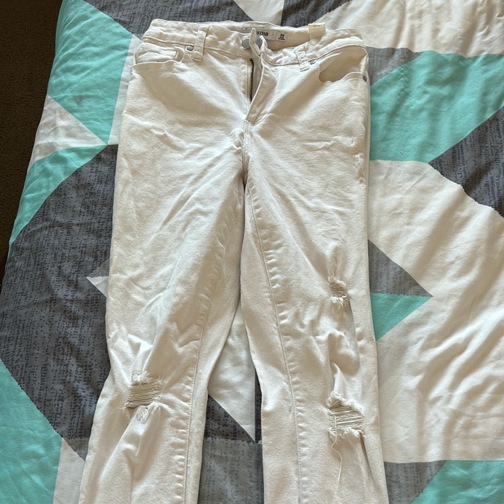White ripped jeans